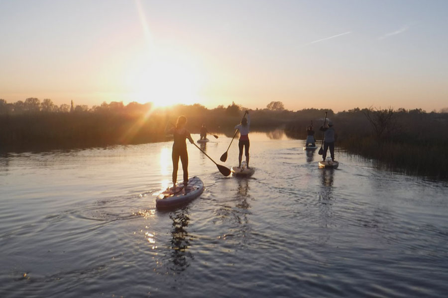 Dilham Hall Retreats stand up paddle boarding on the private canal dilham hall canoe hire kayak  couples norfolk broads dilham hall retreats luxury canoe hire nature 