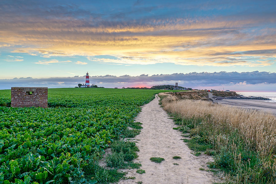 Dilham Hall Retreats happisburgh lighthouse in the distance  couples norfolk broads dilham hall retreats luxury canoe hire nature 